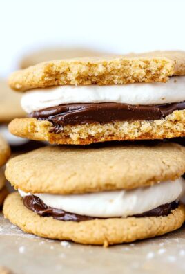 Close-up of peanut butter sandwich cookies filled with marshmallow and chocolate layers